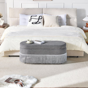 Oval Upholstered Storage Ottoman With Fringe Trim & Lift Top Lid