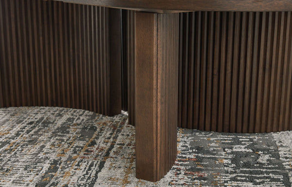Korestone - Oval Cocktail Table - Dark Brown