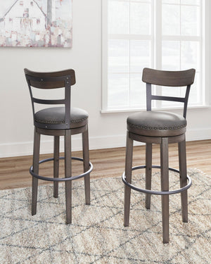 Caitbrook - Tall UPH Swivel Barstool - Gray