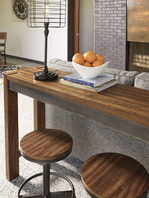 Torjin - 3 Pc. - Long Counter Table, 2 Stools - Dark Brown